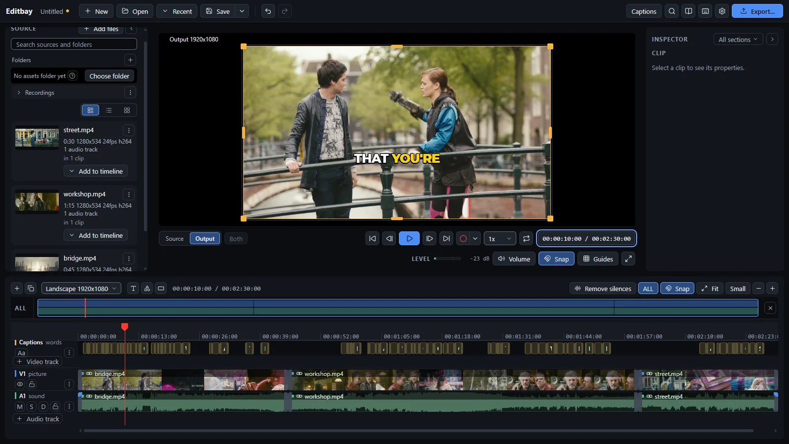 Editbay with a two-person scene on the timeline and captions burned in